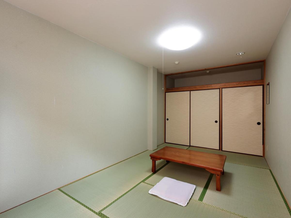 Hotel Tabist Izumi Yusen Shukuhaku Center Exterior foto